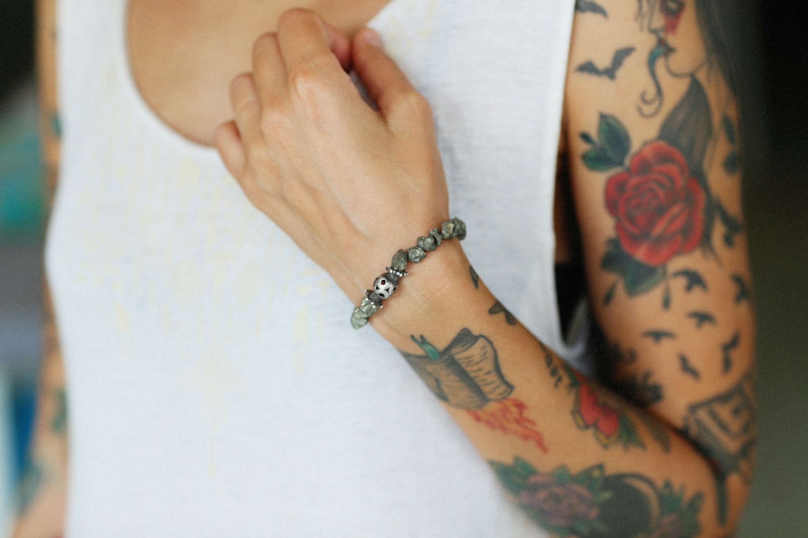 a woman with a tattoo on her arm